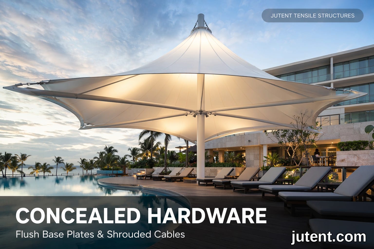 Luxury hotel tensile canopy with white PTFE membrane over pool deck, showing concealed steel connections and flush base plates