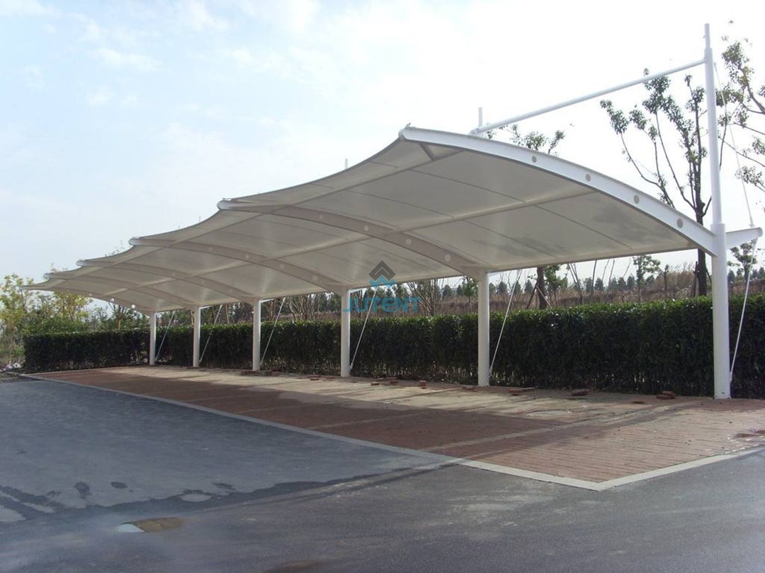 Cable-Stayed Tensile Fabric Carport for Single Parking Bay 01 cable stayed tensile fabric carport with support cables and single parking bay coverage
