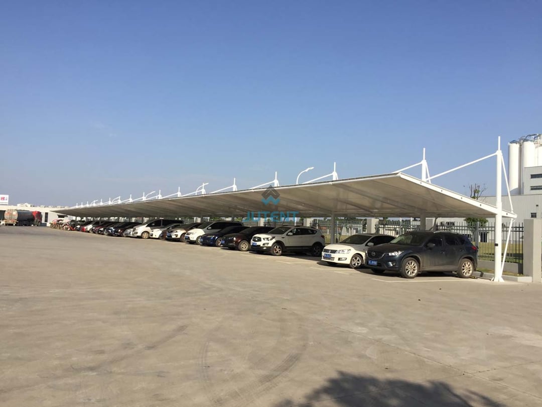 Cable-Stayed Tensile Fabric Carport for Single Parking Bay 03 cable stayed tensile fabric carport with support cables and single parking bay coverage