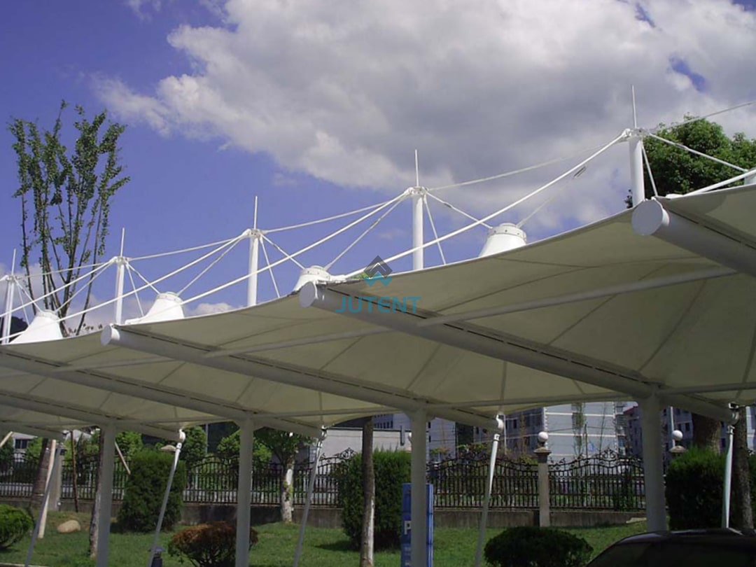 Cable-Stayed Tensile Fabric Carport for Single Parking Bay 04 cable stayed tensile fabric carport with support cables and single parking bay coverage