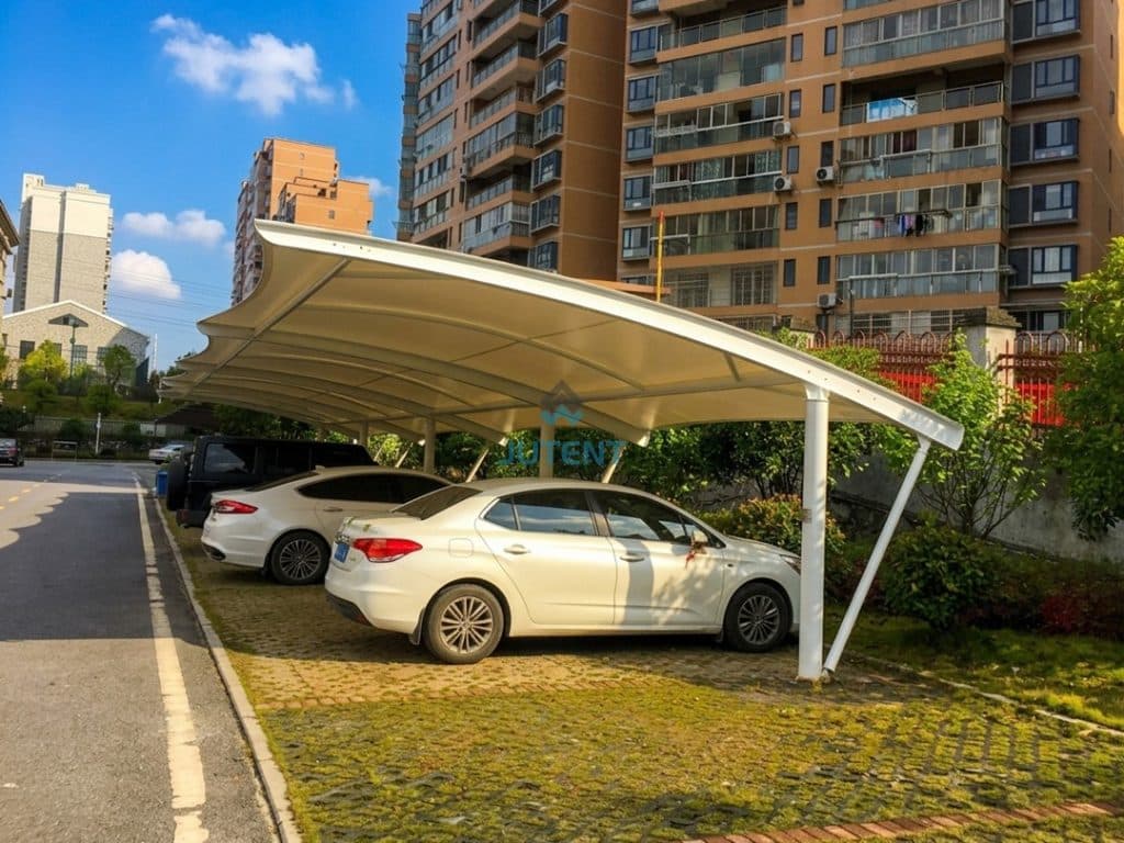 Cantilever car parking shed with single bay tensile membrane structure installed outdoors