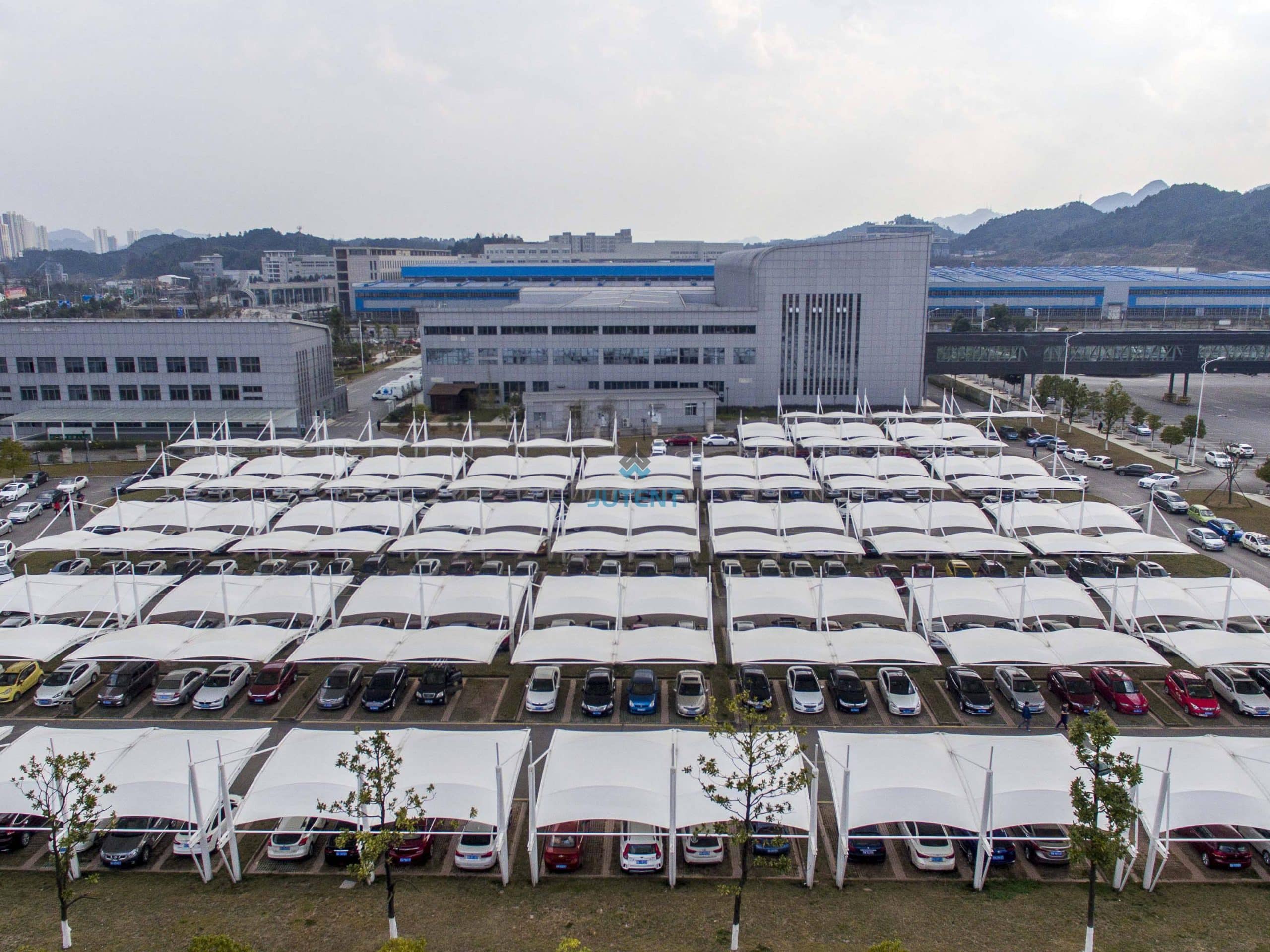 Double Bay Cantilever Tensile Carport Canopy 05 Double bay cantilever tensile carport canopy with steel structure in outdoor parking area