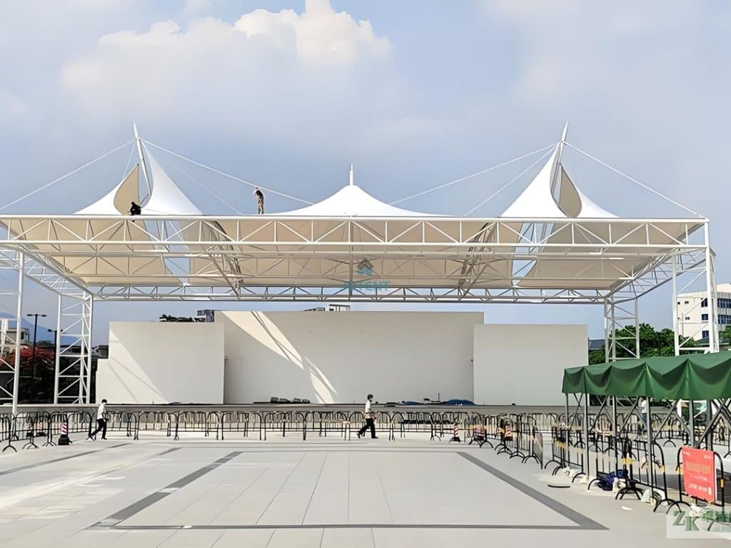 Tensile membrane stage canopy