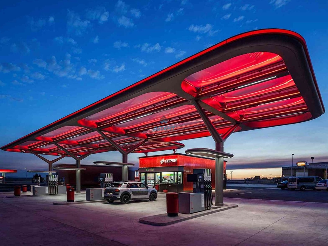 pvdf-coated-architectural-fabric-canopy-surface-detail.jpg PVDF coated architectural fabric used in modern outdoor canopy roofing system.