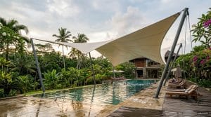 Pool shade in tropical aquatic facility