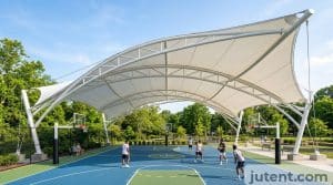 Tensile canopy over full-size basketball court